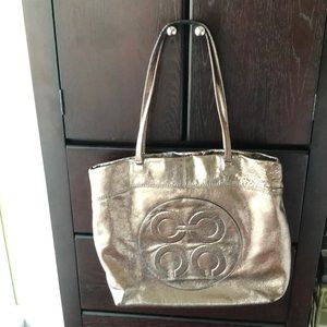 Bronze coach bag.